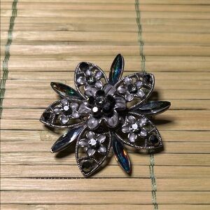 Elegant Silvertone Floral Brooch